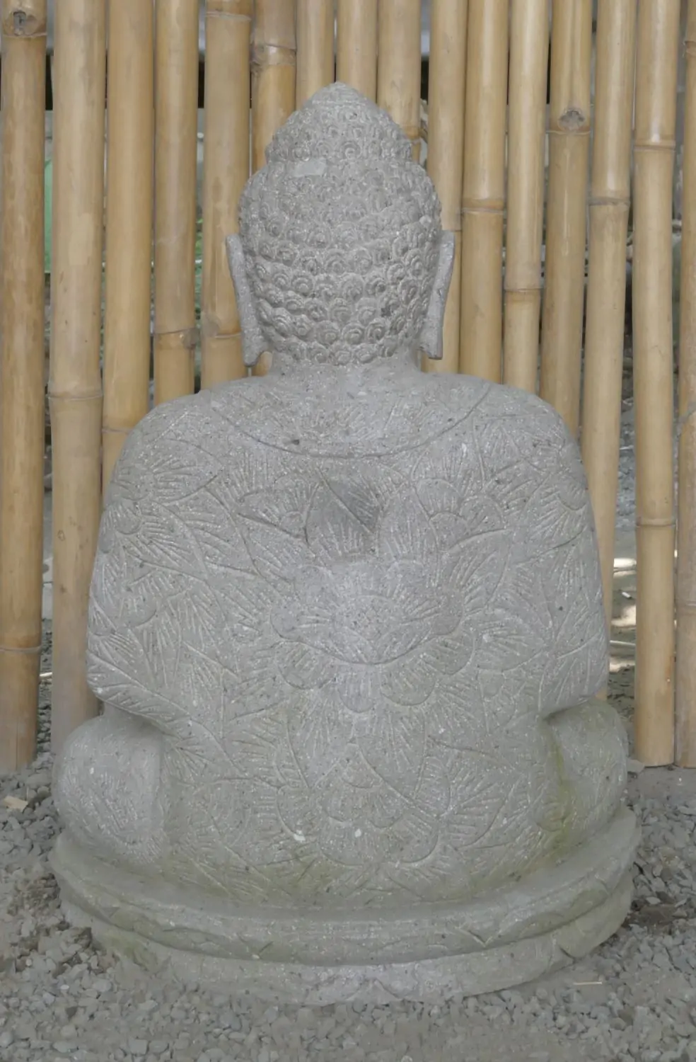  Product image 5 of the product “Seated Buddha with floral carving, Dharmacakra position. 67 cm height. Natural stone (river stone), stonemasonry. There is a stone eye in the chest. ”